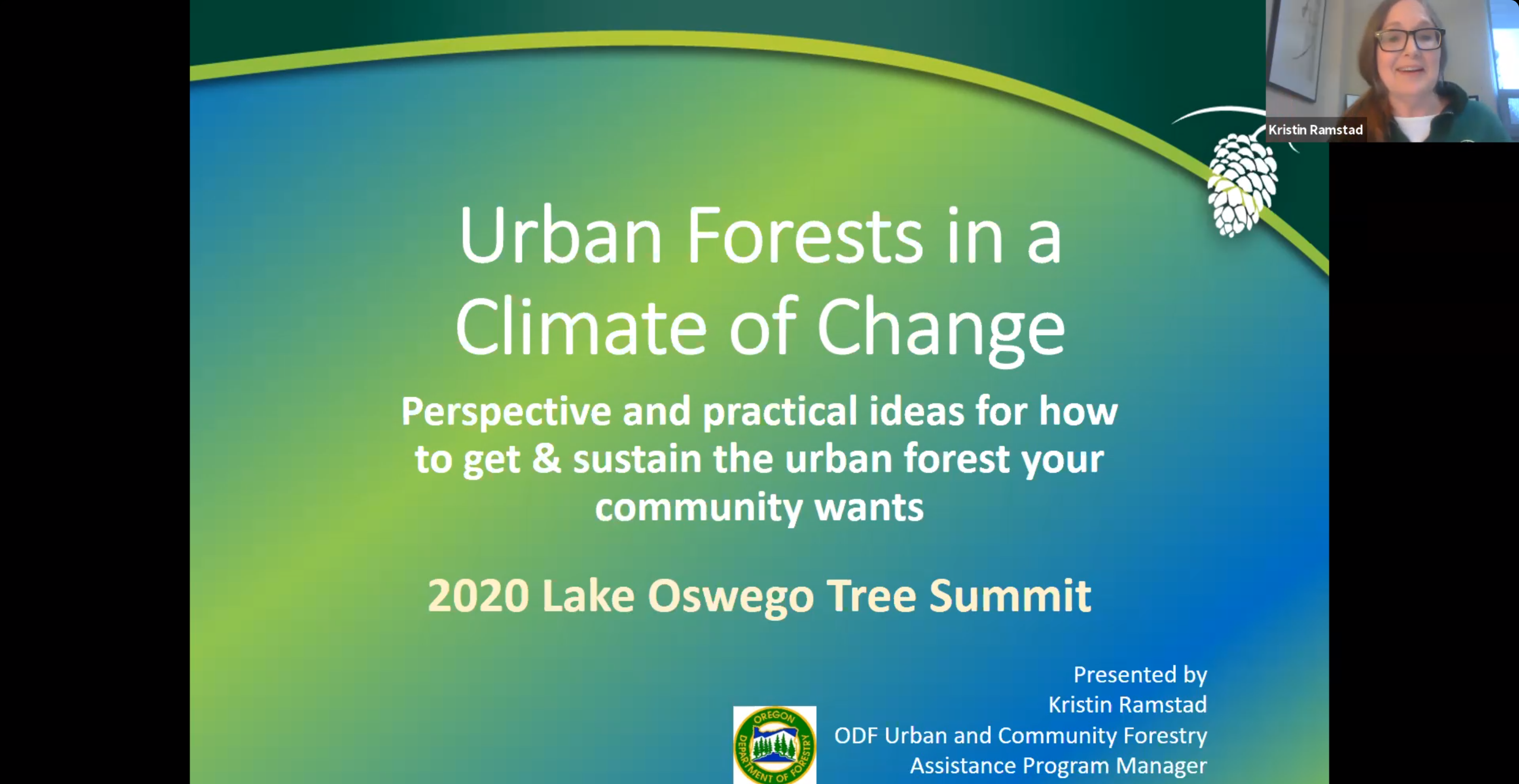 Kristen Presents at the 2020 Tree Summit. We see a screen grab of Kristen and her presentation on Zoom. On screen we see "Urban Forests in a Climate of Change"